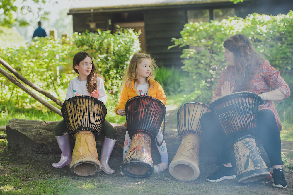 children learning to play drums